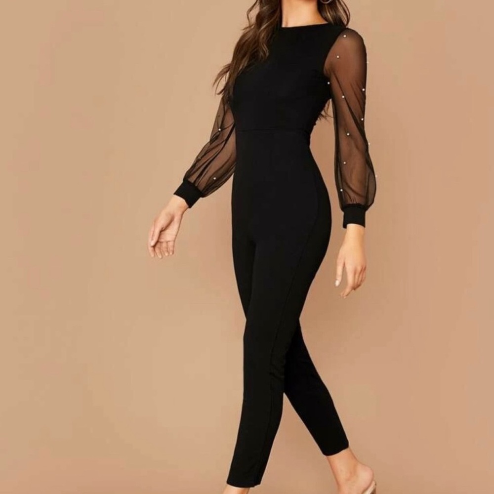 Black jumpsuit with mesh pearl sleeves